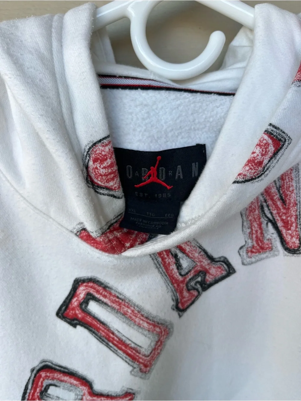 Jordan White Pullover Hoodie with Red and Gold Graphic Accents